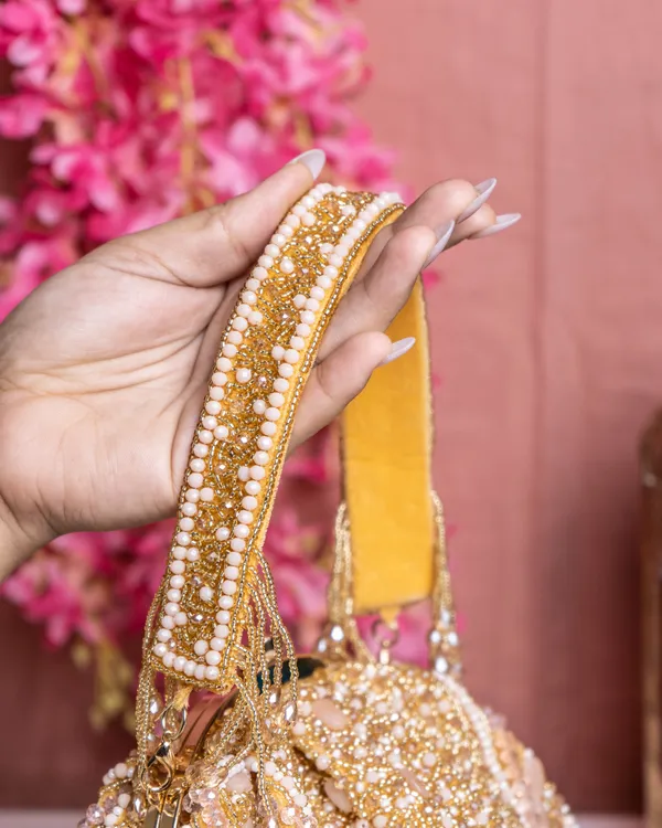 Golden_Beaded_Handbag_with_Fringe_Detailing